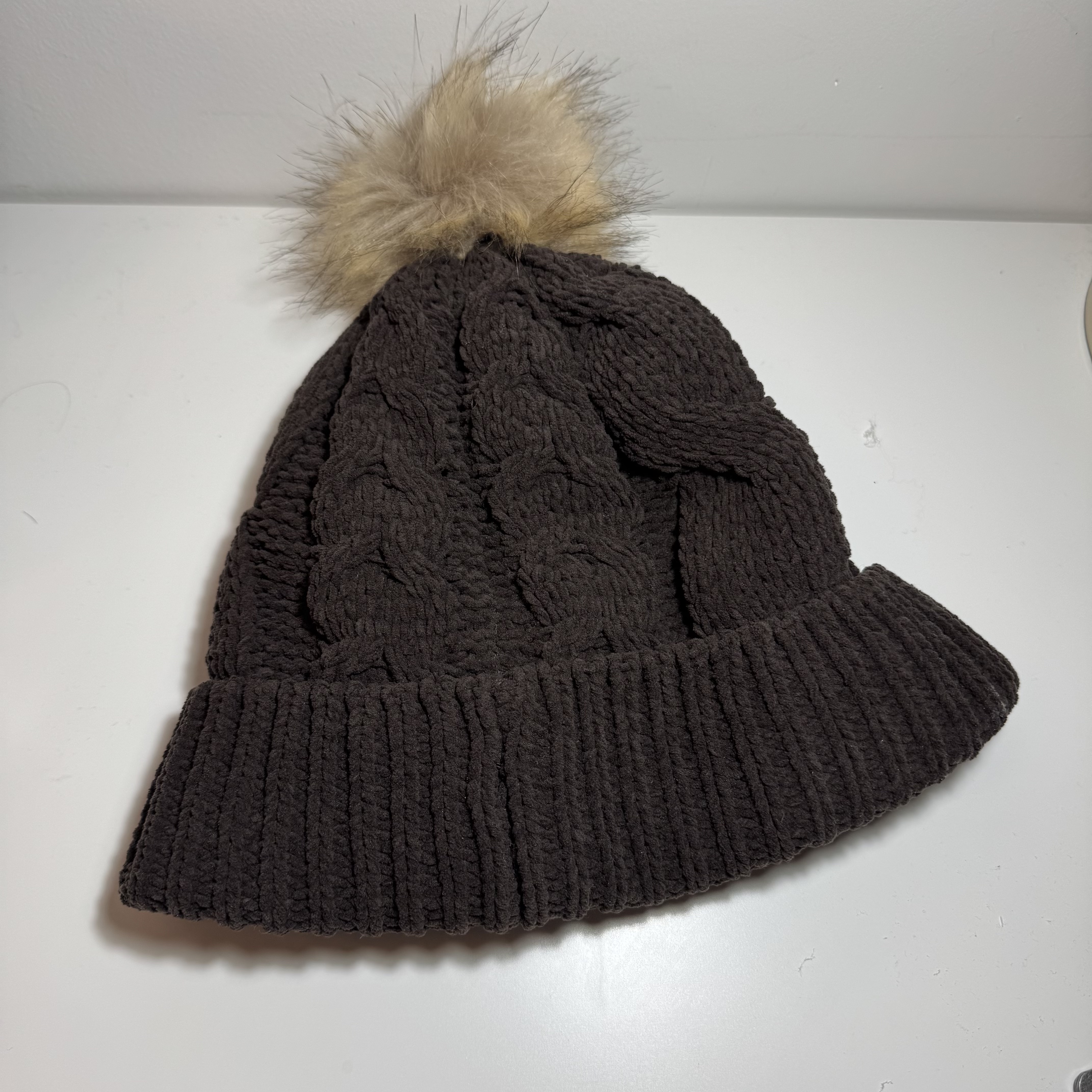 This is my woolen hat. The brim allows user to wear it to activate the circuit on the inside.