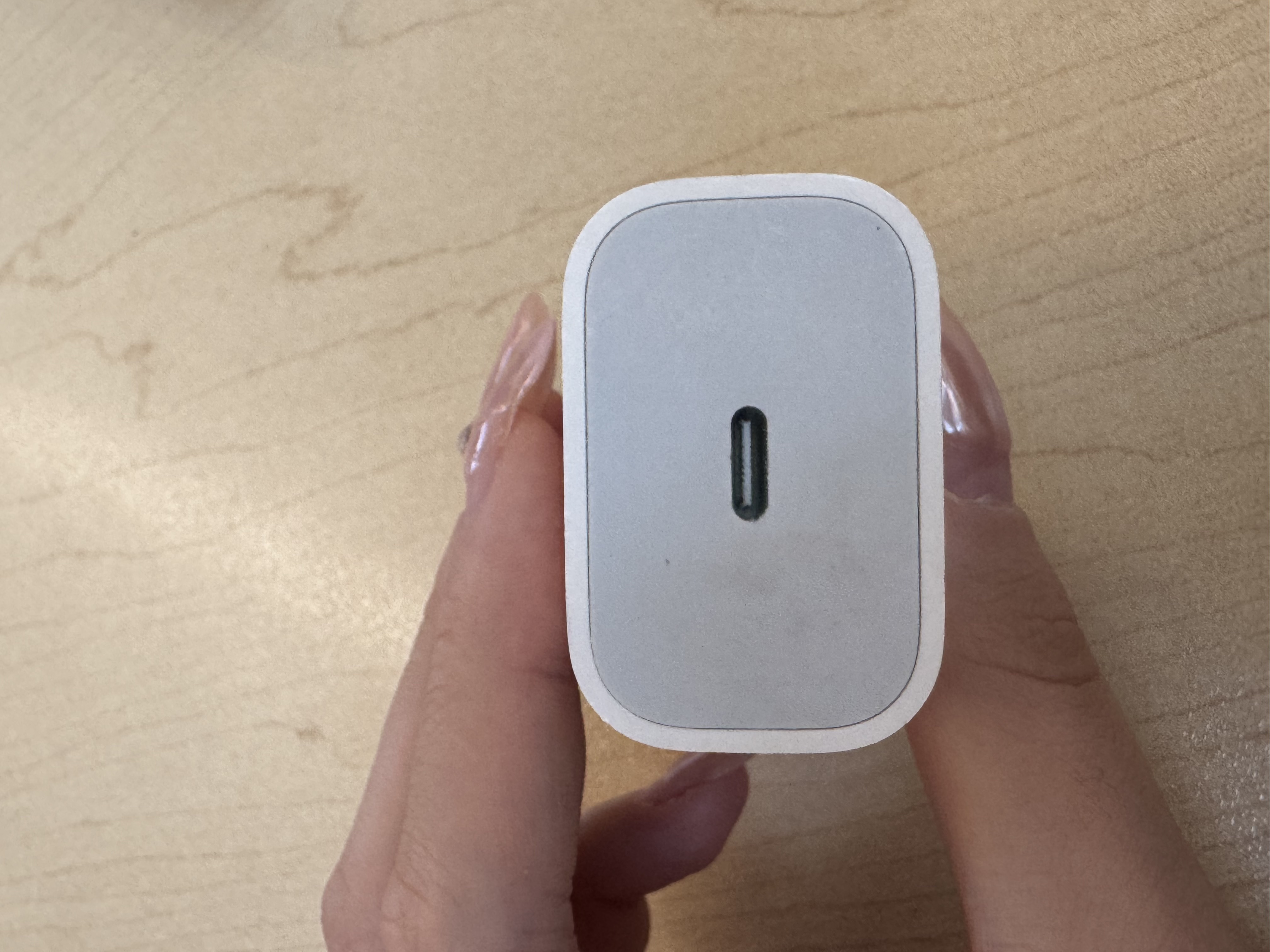 This is a bottom shot image of a charger.