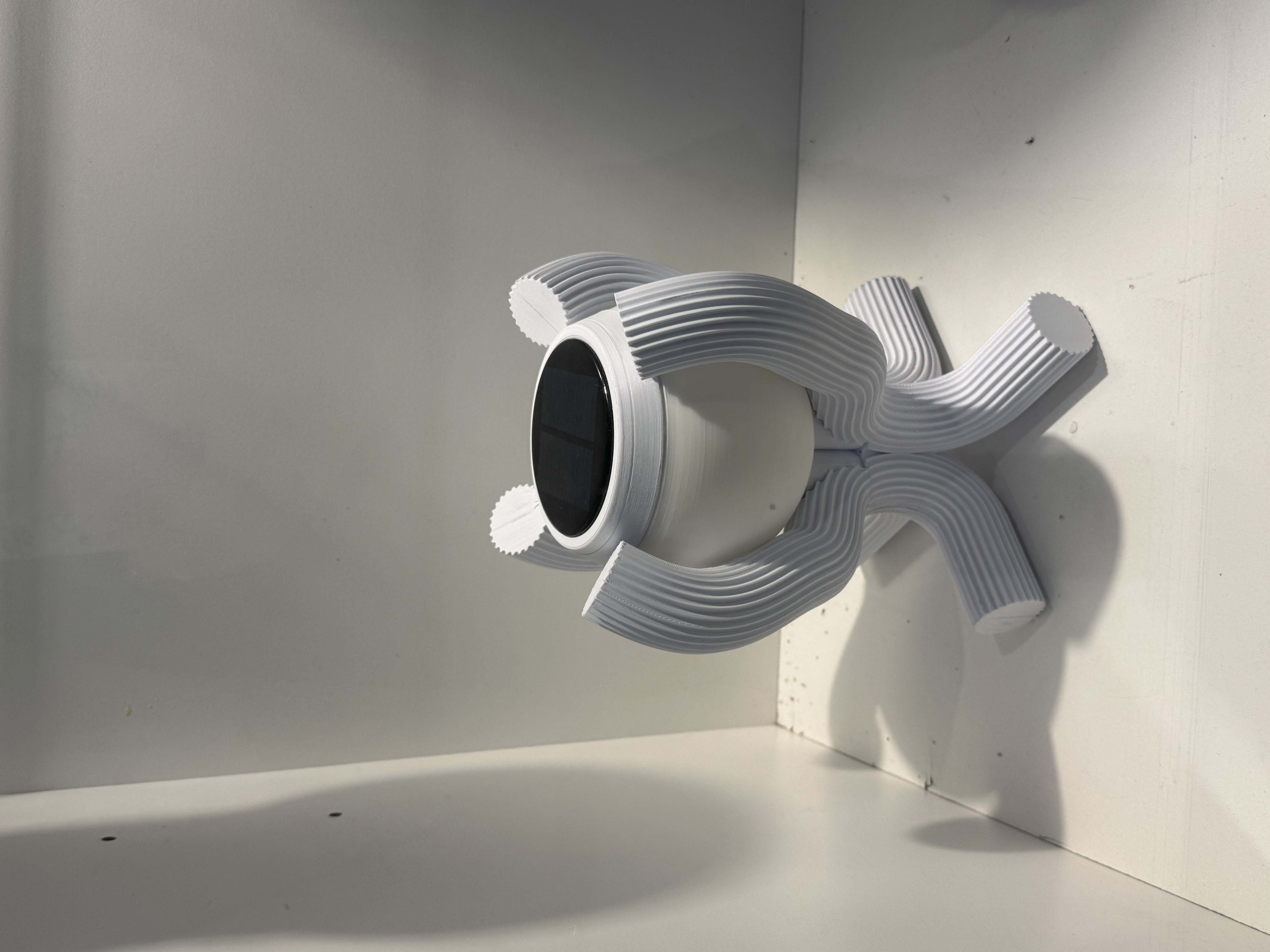 The surface shows visible layering patterns, which looks like 3D-printed plastic (commonly PLA or ABS). The complex structure and regular textures are very characteristic of 3D printing.<div class='container'><iframe class='responsive-iframe' src='https://www.youtube.com/embed/tgbNymZ7vqY'></iframe></div>